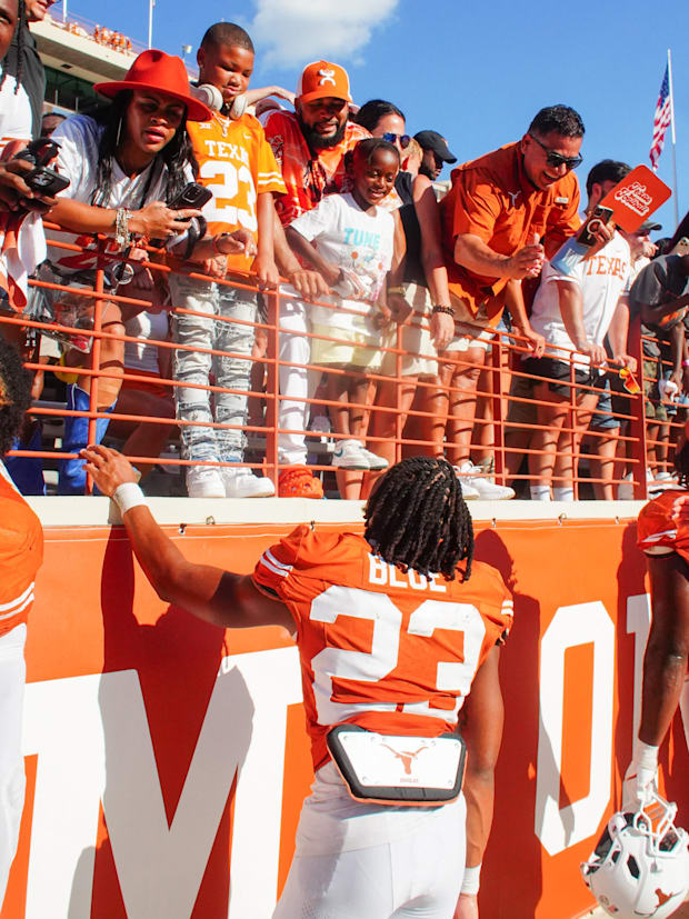 Texas running back Jayden Blue interacts with fans after defeating the Colorado State Rams.