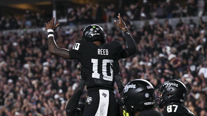 Oct 4, 2025; College Station, Texas, USA; Texas A&M Aggies quarterback Marcel Reed (10) is hoisted in celebration after scoring a touchdown in the fourth quarter against the Mississippi State Bulldogs at Kyle Field. Mandatory Credit: Maria Lysaker-Imagn Images 