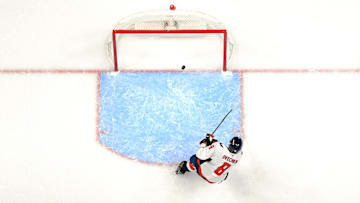 Jan 11, 2025; Nashville, Tennessee, USA;  Washington Capitals left wing Alex Ovechkin (8) scores on an empty net against the Nashville Predators during the third period  at Bridgestone Arena. Mandatory Credit: Steve Roberts-Imagn Images