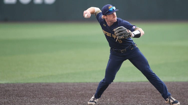 Notre Dame's Jack Brannigan (9) throws to first during the first round of the NCAA Knoxville Super