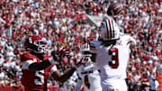 Oct 12, 2024; Tuscaloosa, Alabama, USA;  South Carolina Gamecocks defensive back O'Donnell Fortune (3) intercepts a pass intended for Alabama Crimson Tide wide receiver Germie Bernard (5) during the second half at Bryant-Denny Stadium.  