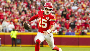 Nov 10, 2024; Kansas City, Missouri, USA; Kansas City Chiefs quarterback Patrick Mahomes (15) scrambles during the second half against the Denver Broncos at GEHA Field at Arrowhead Stadium. Mandatory Credit: Jay Biggerstaff-Imagn Images