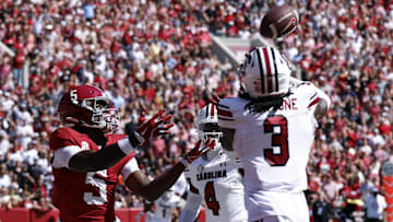 Oct 12, 2024; Tuscaloosa, Alabama, USA;  South Carolina Gamecocks defensive back O'Donnell Fortune (3) intercepts a pass intended for Alabama Crimson Tide wide receiver Germie Bernard (5) during the second half at Bryant-Denny Stadium. Mandatory Credit: Butch Dill-Imagn Images