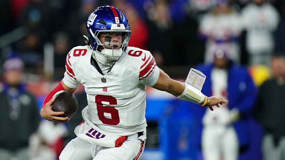 Dec 1, 2025; Foxborough, Massachusetts, USA; New York Giants quarterback Jaxson Dart (6) runs with the ball during the second quarter against the New England Patriots at Gillette Stadium. Mandatory Credit: David Butler II-Imagn Images