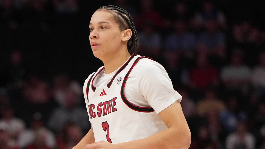 Mar 11, 2026; Charlotte, NC, USA; NC State Wolfpack guard Matt Able (3) brings the ball up the court in the second half at Spectrum Center. Mandatory Credit: Bob Donnan-Imagn Images