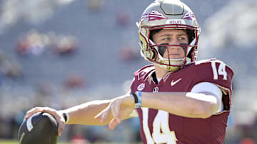 Nov 23, 2024; Tallahassee, Florida, USA; Florida State Seminoles quarterback Luke Kromenhoek (14) warms up before the game against the Charleston Southern Buccaneers at Doak S. Campbell Stadium. Mandatory Credit: Melina Myers-Imagn Images