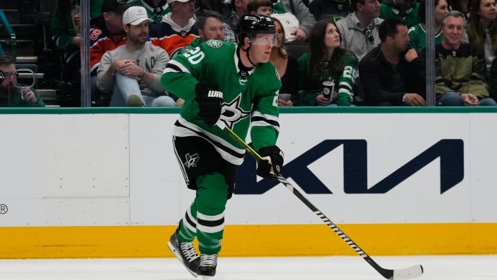 Feb 17, 2024; Dallas, Texas, USA;  Dallas Stars defenseman Ryan Suter (20) skates with the puck against the Edmonton Oilers during the first period at American Airlines Center. Mandatory Credit: Chris Jones-USA TODAY Sports