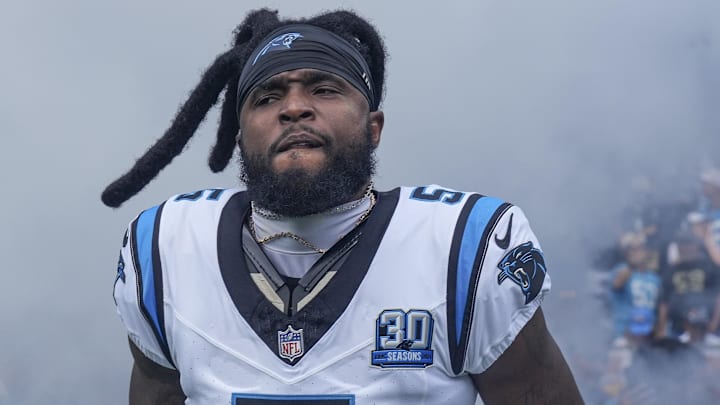 Sep 15, 2024; Charlotte, North Carolina, USA; Carolina Panthers wide receiver Diontae Johnson (5) takes the field against the Los Angeles Chargers during the first quarter at Bank of America Stadium. Mandatory Credit: Jim Dedmon-Imagn Images