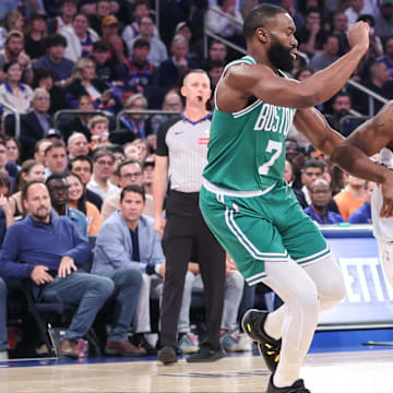 May 10, 2025; New York, New York, USA; New York Knicks forward OG Anunoby (8) drives past Boston Celtics guard Jaylen Brown (7) in the first quarter during game three of the second round for the 2025 NBA Playoffs at Madison Square Garden. Mandatory Credit: Wendell Cruz-Imagn Images