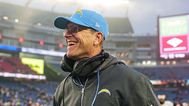Dec 28, 2024; Foxborough, Massachusetts, USA; Los Angeles Chargers head coach Jim Harbaugh reacts after defeating the New England Patriots at Gillette Stadium. Mandatory Credit: David Butler II-Imagn Images