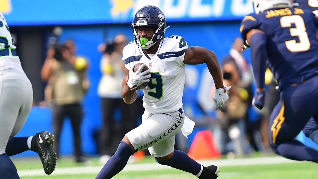 Oct 23, 2022; Inglewood, California, USA; Seattle Seahawks running back Kenneth Walker III (9) runs the ball against the Los Angeles Chargers during the first half at SoFi Stadium. Mandatory Credit: Gary A. Vasquez-Imagn Images