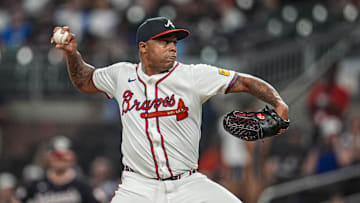 Sep 23, 2025; Cumberland, Georgia, USA; Atlanta Braves relief pitcher Raisel Iglesias (26)  pitches against the Washington Nationals during the ninth inning at Truist Park. Mandatory Credit: Dale Zanine-Imagn Images