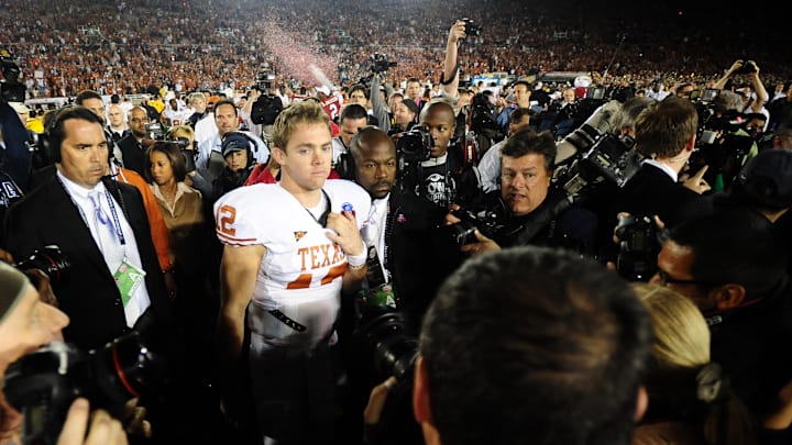 Jan 7, 2010; Pasadena, CA, USA; Texas Longhorns quarterback Colt McCoy (12) walks off the field after the 2010 BCS national championship game against the Alabama Crimson Tide at the Rose Bowl.  Alabama won 37-21. Mandatory Credit: Mark J. Rebilas-Imagn Images