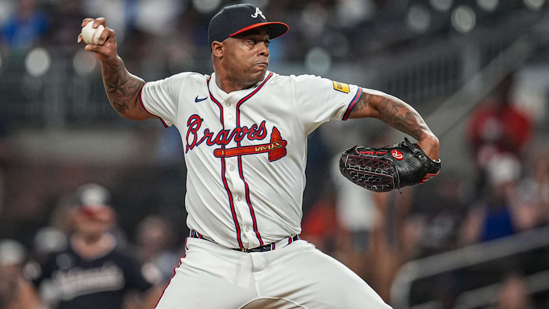 Sep 23, 2025; Cumberland, Georgia, USA; Atlanta Braves relief pitcher Raisel Iglesias (26) pitches against the Washington Nationals during the ninth inning at Truist Park. Sep 23, 2025; Cumberland, Georgia, USA; Atlanta Braves relief pitcher Raisel Iglesias (26) pitches against the Washington Nationals during the ninth inning at Truist Park.