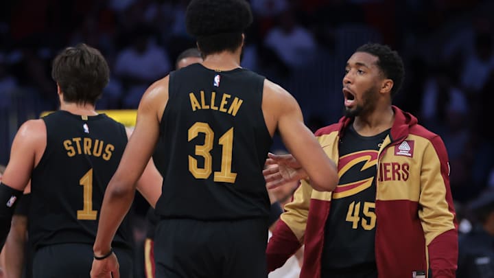 Apr 28, 2025; Miami, Florida, USA; Cleveland Cavaliers guard Donovan Mitchell (45) celebrates with center Jarrett Allen (31) against the Miami Heat in the second quarter during game four for the first round of the 2025 NBA Playoffs at Kaseya Center. Mandatory Credit: Sam Navarro-Imagn Images Apr 28, 2025; Miami, Florida, USA; Cleveland Cavaliers guard Donovan Mitchell (45) celebrates with center Jarrett Allen (31) against the Miami Heat in the second quarter during game four for the first round of the 2025 NBA Playoffs at Kaseya Center. Mandatory Credit: Sam Navarro-Imagn Images