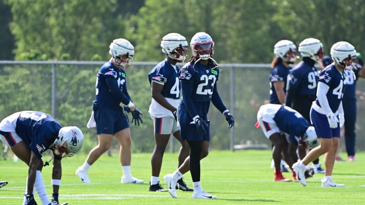 Jul 26, 2023; Foxborough, MA, USA; New England Patriots safety Kyle Dugger (23) stretches during training camp at Gillette Stadium. Mandatory Credit: Eric Canha-USA TODAY Sports