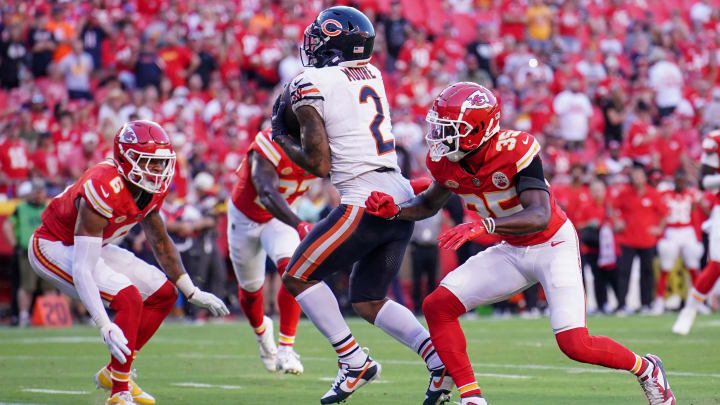 Sep 24, 2023; Kansas City, Missouri, USA; Chicago Bears wide receiver DJ Moore (2) catches a pass for a touchdown as Kansas City Chiefs cornerback Jaylen Watson (35) makes the tackle during the second half at GEHA Field at Arrowhead Stadium. Mandatory Credit: Denny Medley-USA TODAY Sports