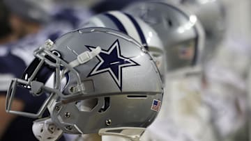 Jan 8, 2023; Landover, Maryland, USA; Dallas Cowboys players' helmets rest on the bench against the Washington Commanders at FedExField. Mandatory Credit: Geoff Burke-Imagn Images