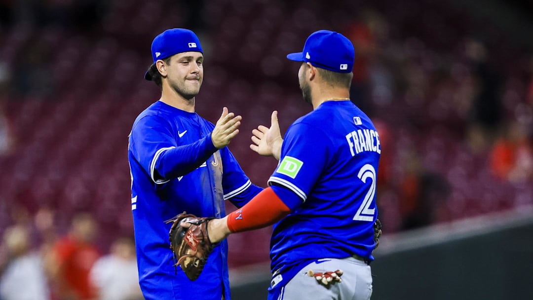 Sep 3, 2025; Cincinnati, Ohio, USA; Toronto Blue Jays third baseman Ernie Clement (22) shakes hands with first baseman Ty France (2) after the victory over the Cincinnati Reds at Great American Ball Park. 