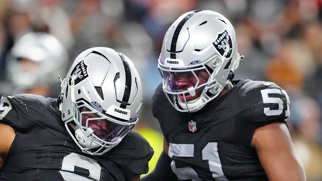 Jan 4, 2026; Paradise, Nevada, USA; Las Vegas Raiders defensive end Tyree Wilson (9) celebrates with Las Vegas Raiders defensive end Malcolm Koonce (51) after sacking Kansas City Chiefs quarterback Chris Oladokun (19) for a safety during the fourth quarter at Allegiant Stadium. Mandatory Credit: Stephen R. Sylvanie-Imagn Images