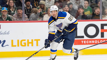 Mar 15, 2025; Saint Paul, Minnesota, USA; St. Louis Blues center Jordan Kyrou (25) gets a breakaway and will score on a wrap-around behind the Minnesota Wild net in the third period at Xcel Energy Center. Mandatory Credit: Matt Blewett-Imagn Images