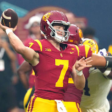 Sep 1, 2024; Paradise, Nevada, USA; Southern California Trojans quarterback Miller Moss (7) throws a pass against the LSU Tigers during the first quarter at Allegiant Stadium. Mandatory Credit: Stephen R. Sylvanie-Imagn Images