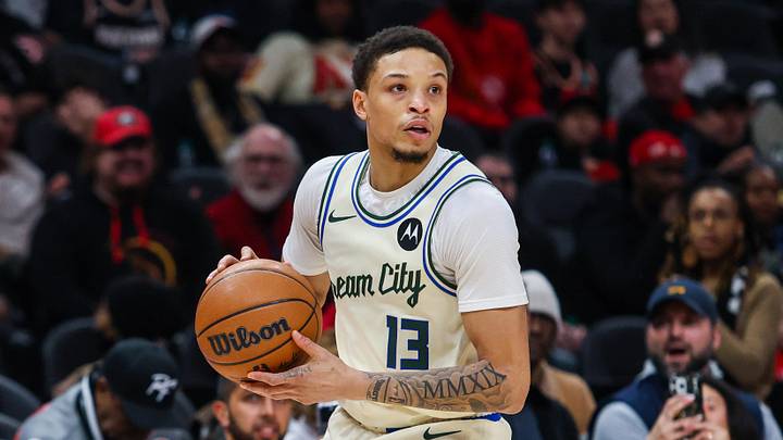 Milwaukee Bucks guard Ryan Rollins (13) looks to pass the ball against the Atlanta Hawks during the first quarter at State Farm Arena on January 19, 2026.