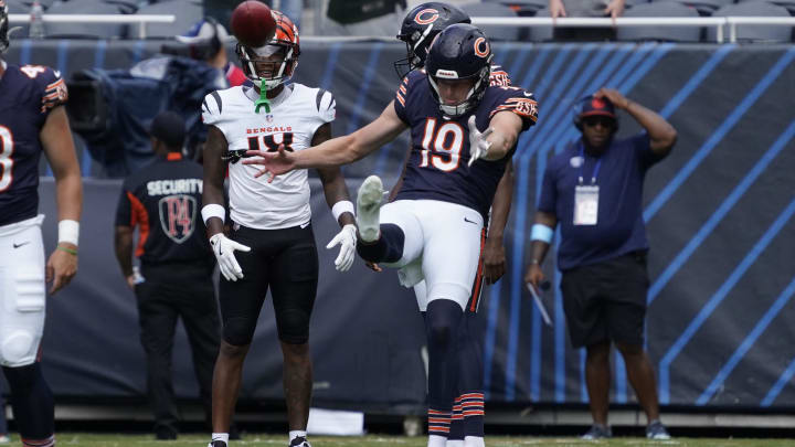  Tory Taylor punts in pregame warmups at Soldier Field,.