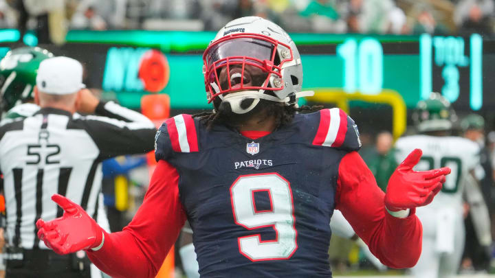  Sep 24, 2023; East Rutherford, New Jersey, USA; New York Jets quarterback Zach Wilson (2) is sacked for a safety by New England Patriots linebacker Matthew Judon (9) in the 4th quarter at MetLife Stadium. Mandatory Credit: Robert Deutsch-USA TODAY Sports