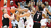 Indiana Hoosiers guard Trey Galloway (32) rebounds the ball against SIU Edwardsville Cougars guard Jordan Pickett (1) during the first half at Simon Skjodt Assembly Hall.