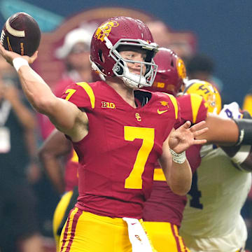 Sep 1, 2024; Paradise, Nevada, USA; Southern California Trojans quarterback Miller Moss (7) throws a pass against the LSU Tigers during the first quarter at Allegiant Stadium. Mandatory Credit: Stephen R. Sylvanie-Imagn Images