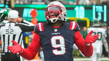  Sep 24, 2023; East Rutherford, New Jersey, USA; New York Jets quarterback Zach Wilson (2) is sacked for a safety by New England Patriots linebacker Matthew Judon (9) in the 4th quarter at MetLife Stadium. Mandatory Credit: Robert Deutsch-USA TODAY Sports