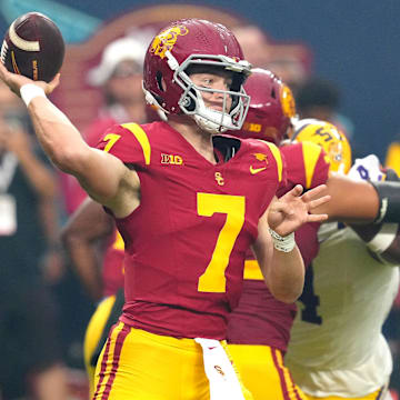 Sep 1, 2024; Paradise, Nevada, USA; Southern California Trojans quarterback Miller Moss (7) throws a pass against the LSU Tigers during the first quarter at Allegiant Stadium. 