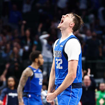 Oct 24, 2025; Dallas, Texas, USA;  Dallas Mavericks forward Cooper Flagg (32) reacts during the second half against the Washington Wizards at American Airlines Center. Mandatory Credit: Kevin Jairaj-Imagn Images