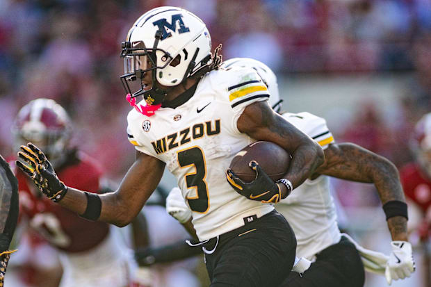 Missouri Tigers wide receiver Luther Burden III (3) runs the ball against the Alabama Crimson Tide