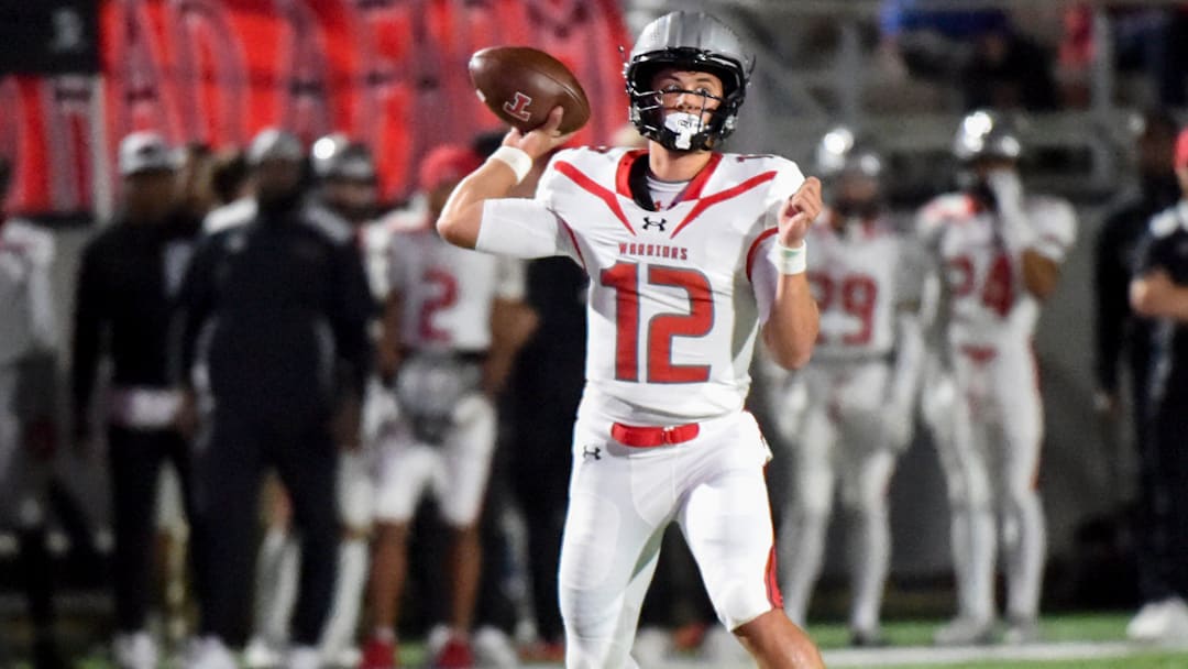 Thompson's quarterback Trent Seaborn (12) passes against Prattville during their game in Prattville, Ala., on Friday October 24, 2025.