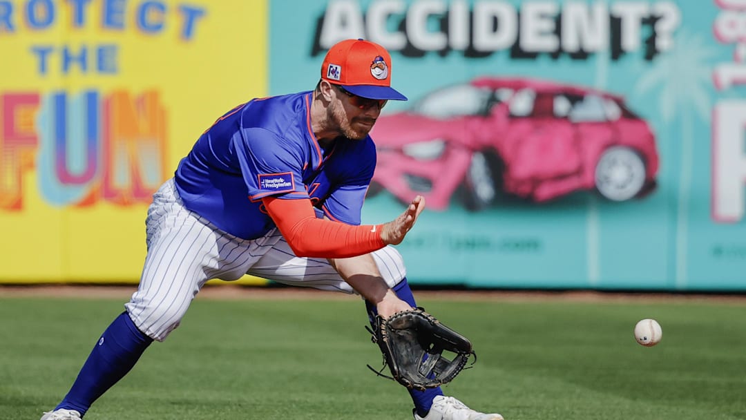 Feb 23, 2025; Port St. Lucie, Florida, USA;  New York Mets shortstop Donovan Walton fields a ground ball during the seventh inning against the Miami Marlins at Clover Park. Mandatory Credit: Reinhold Matay-Imagn Images