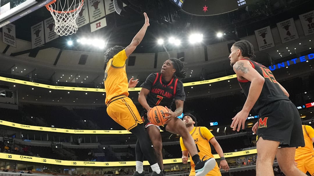 Mar 11, 2026; Chicago, IL, USA; Iowa Hawkeyes defends Maryland Terrapins guard Andre Mills (7) during the second half at United Center. Mandatory Credit: David Banks-Imagn Images