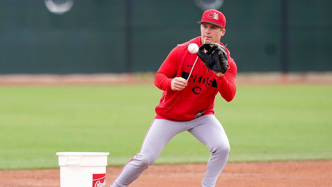 Matt McLain (9) run drills on the field during the first day of full squad workouts, Monday, Feb. 16, 2026, at the Cincinnati Reds player development complex in Goodyear, Ariz.