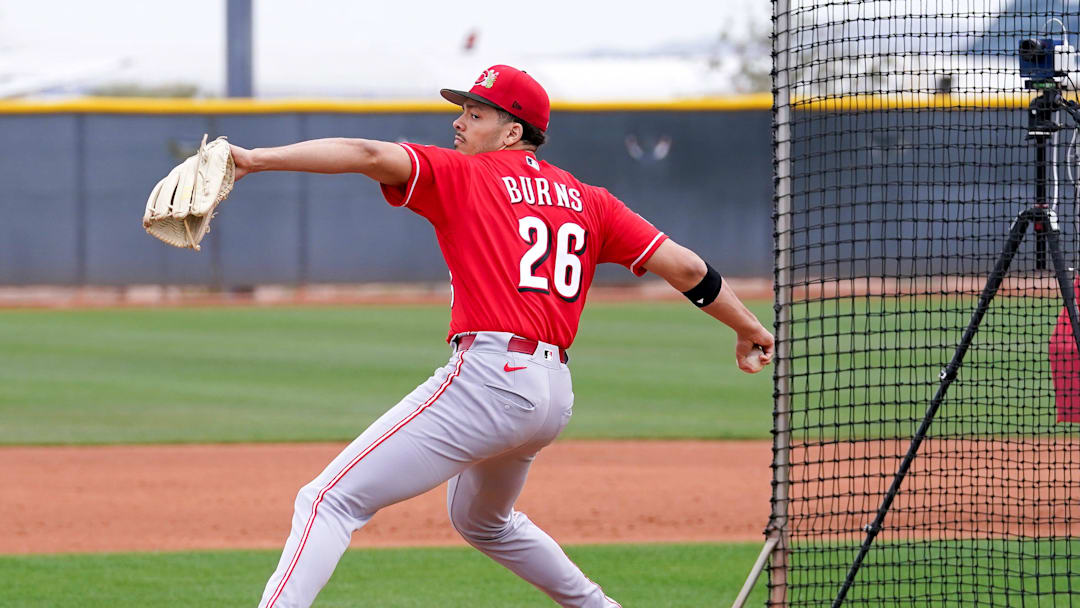 Cincinnati Reds pitcher Chase Burns practices his pitch during the first day of full squad workouts, Monday, Feb. 16, 2026, at the Cincinnati Reds player development complex in Goodyear, Ariz.