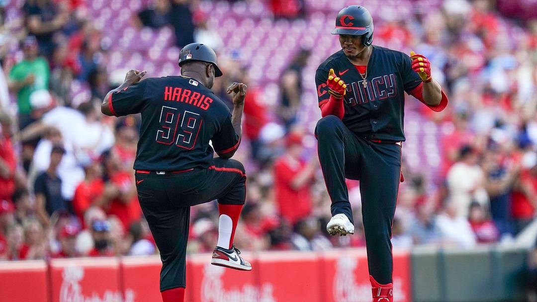 Cincinnati Reds third base coach Willie Harris (99) and right fielder Noelvi Marte (4) celebrate after Marte hits a homer in the second inning of a MLB game between the Cincinnati Reds and Arizona Diamondbacks, Friday, June 12, 2026, at Great American Ball Park in downtown Cincinnati. Cincinnati Reds third base coach Willie Harris (99) and right fielder Noelvi Marte (4) celebrate after Marte hits a homer in the second inning of a MLB game between the Cincinnati Reds and Arizona Diamondbacks, Friday, June 12, 2026, at Great American Ball Park in downtown Cincinnati.
