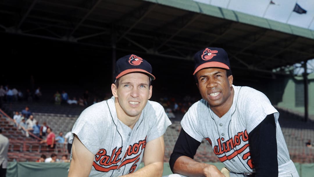 Unknown Date; Boston, MA, USA; FILE PHOTO: Brooks Robinson (left) Frank Robinson (right) Baltimore Orioles portrait at Fenway Park. Mandatory Credit: Photo by Malcolm Emmons-Imagn Images Copyright © Malcolm Emmons