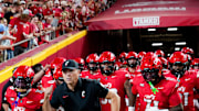 The Cincinnati Bearcats run out the tunnel to face off against the Nebraska Cornhuskers at the Kansas City Classic, Aug. 28, 2025, at Arrowhead Stadium in Kansas City, Mo.