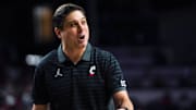 Cincinnati Bearcats head coach Wes Miller speaks out to a referee in the second half of a NCAA men’s basketball game between the Cincinnati Bearcats and Eastern Michigan Eagles, Wednesday, Nov. 26, 2025, at Fifth Third Arena in Cincinnati. Eagles won 64-56.