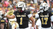Alabama State quarterback Andrew Body (1) celebrates hish ruching touchdown against Alabama A&M during the Magic City Classic at Legion Field in Birmingham, Ala., on Saturday October 25, 2025.