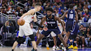 Feb 11, 2023; Orlando, Florida, USA; Orlando Magic forward Jonathan Isaac (1) defends Miami Heat guard Tyler Herro (14) during the second half at Amway Center. Mandatory Credit: Mike Watters-Imagn Images