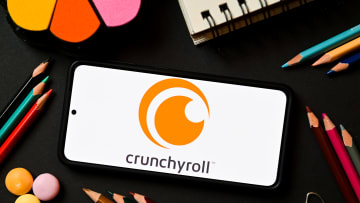 In this photo illustration a Crunchyroll logo seen displayed...