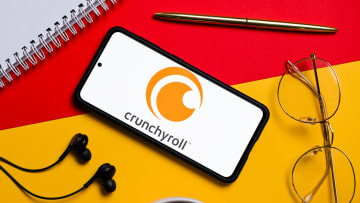 In this photo illustration a Crunchyroll logo seen displayed...