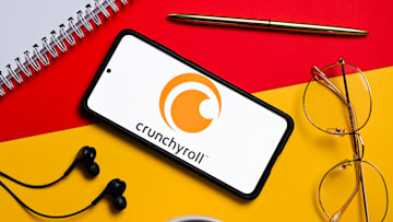 In this photo illustration a Crunchyroll logo seen displayed...