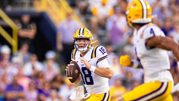 Sep 6, 2025; Baton Rouge, Louisiana, USA;  LSU Tigers quarterback Garrett Nussmeier (18) passes to wide receiver Nic Anderson (4) against Louisiana Tech Bulldogs during the first half against Louisiana Tech Bulldogs at Tiger Stadium. Mandatory Credit: Stephen Lew-Imagn Images
